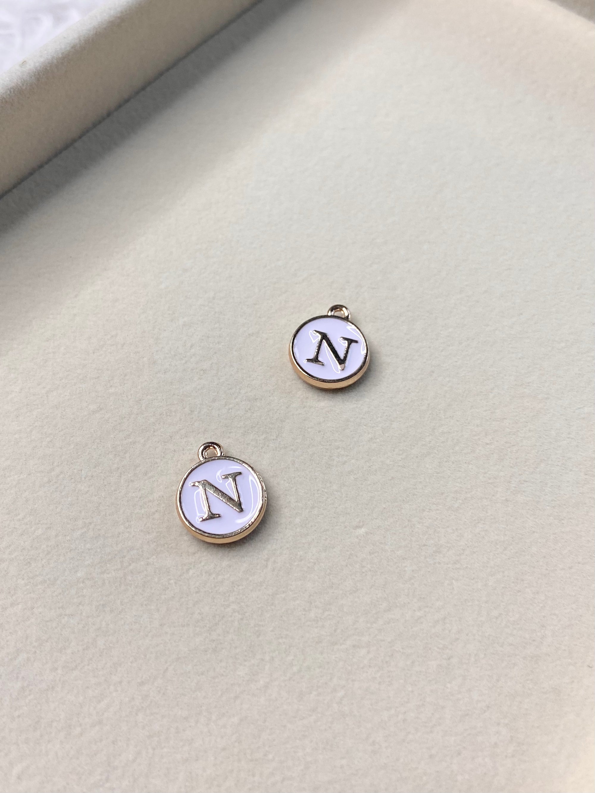 White Circle Letter N Charm