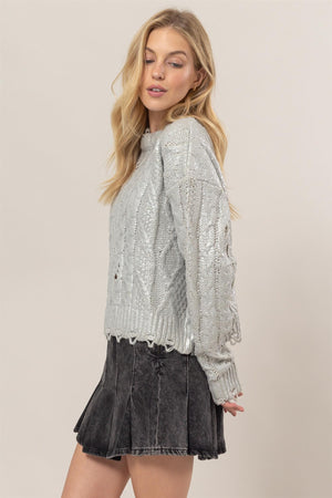 A Glistening Night Distressed Cable-Knit Sweater