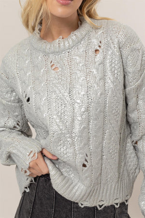 A Glistening Night Distressed Cable-Knit Sweater